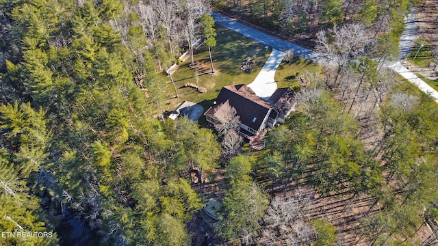 bird's eye view featuring a view of trees