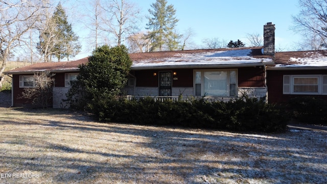 ranch-style home featuring covered porch