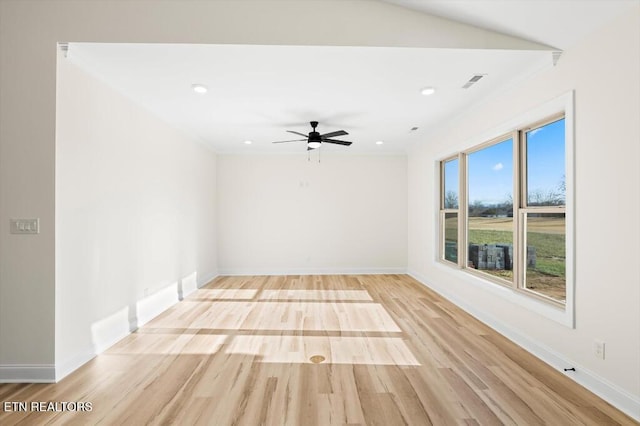 empty room featuring light hardwood / wood-style floors and ceiling fan