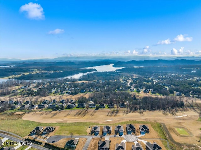 birds eye view of property featuring a mountain view and a rural view