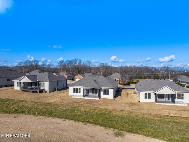 single story home featuring a front yard and a patio