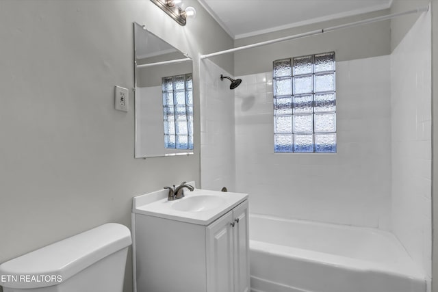 full bathroom featuring a wealth of natural light, toilet, vanity, and shower / washtub combination