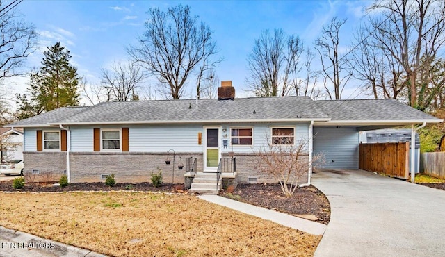 ranch-style home with a carport