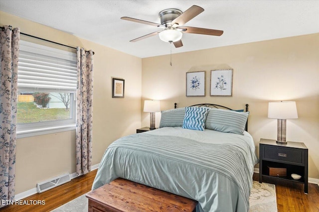 bedroom featuring ceiling fan and hardwood / wood-style flooring