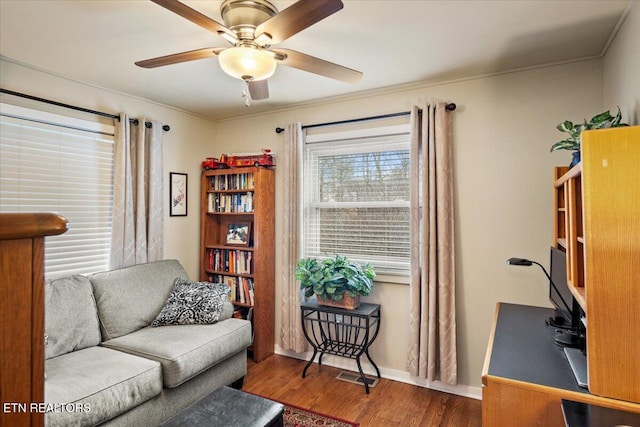 interior space with ceiling fan and hardwood / wood-style flooring