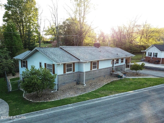 view of front of house with a front lawn