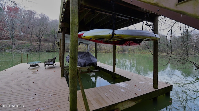 dock area featuring a water view