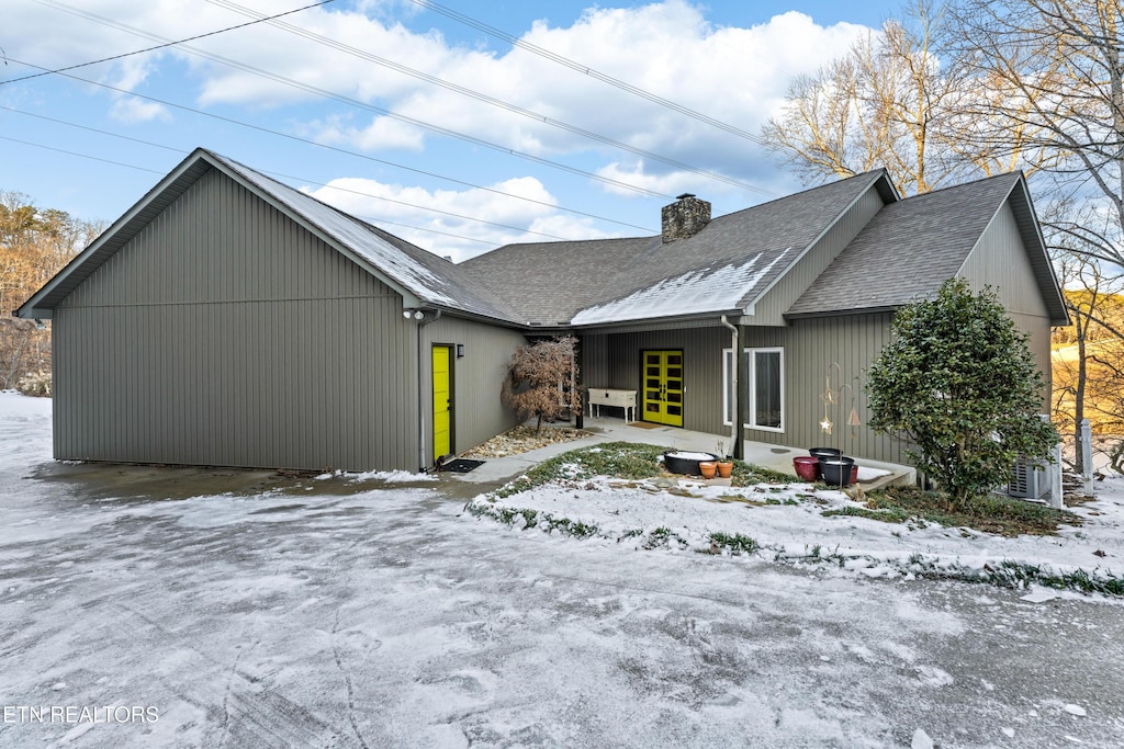 view of snow covered property