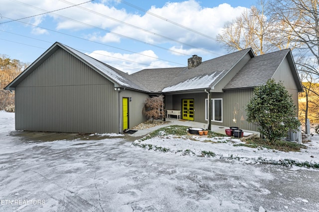 view of snow covered property