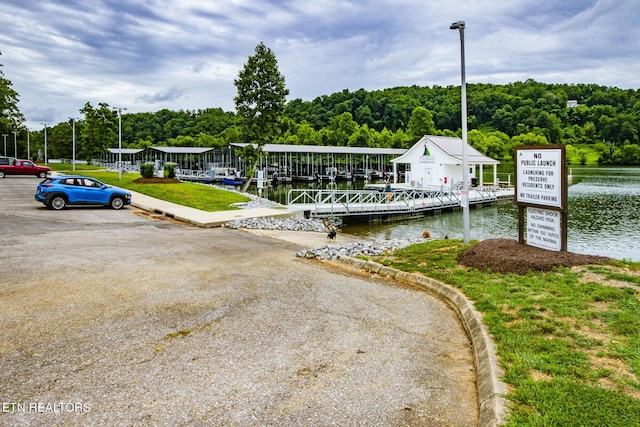 dock area featuring a water view