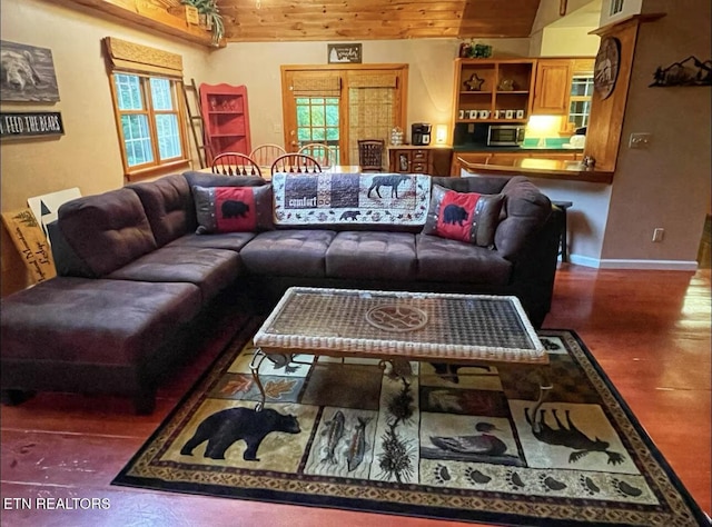 living room featuring lofted ceiling and wooden ceiling