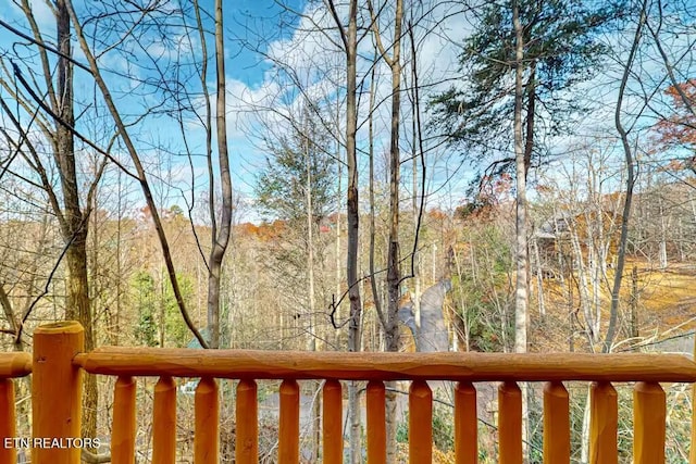 view of yard featuring a balcony