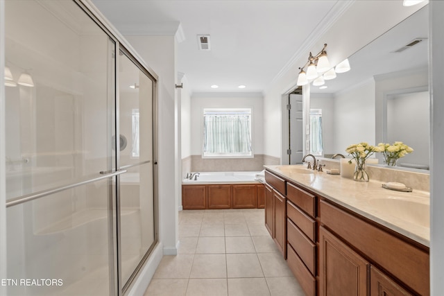 full bathroom featuring tile patterned flooring, visible vents, crown molding, a stall shower, and a sink