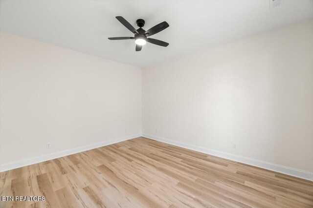 unfurnished room with ceiling fan and light hardwood / wood-style floors