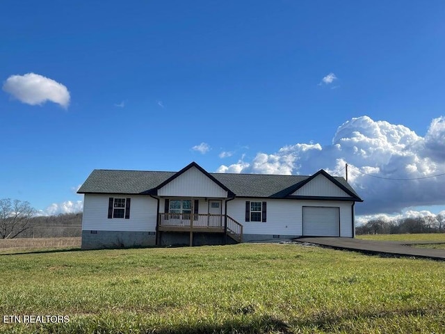 ranch-style home with a porch, a garage, and a front lawn