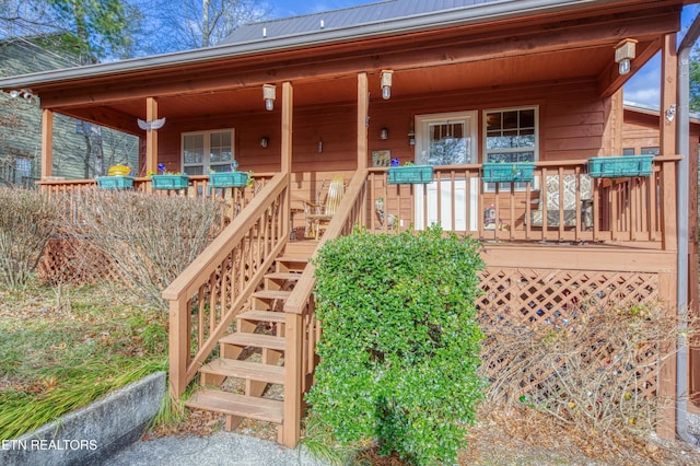 property entrance with a porch