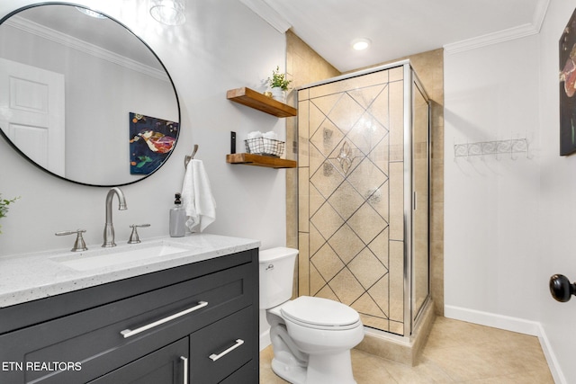 bathroom with tile patterned floors, vanity, toilet, a shower with shower door, and crown molding