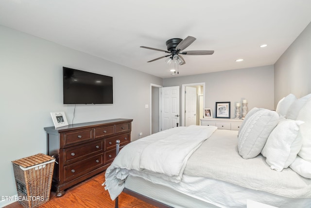 bedroom featuring ceiling fan and light wood-type flooring