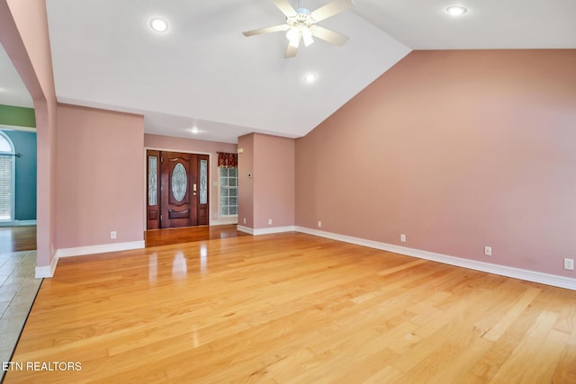 entryway featuring ceiling fan, lofted ceiling, and hardwood / wood-style floors