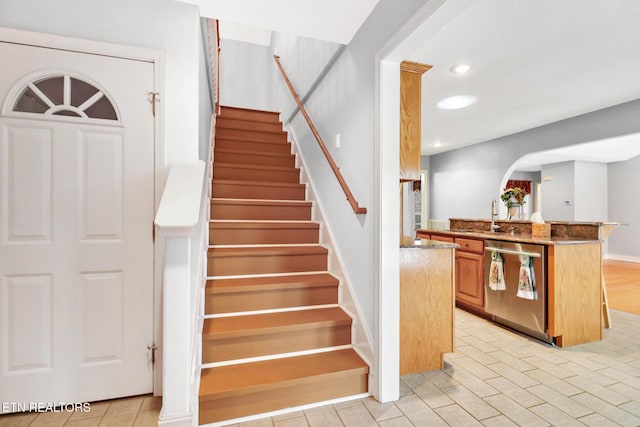 staircase with sink