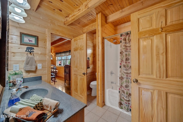 bathroom with a shower with curtain, wooden walls, sink, beam ceiling, and wooden ceiling