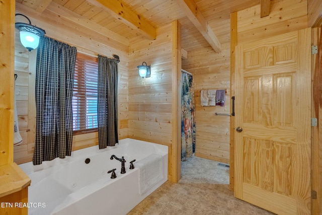 bathroom with beam ceiling, a bathing tub, wood walls, and wooden ceiling