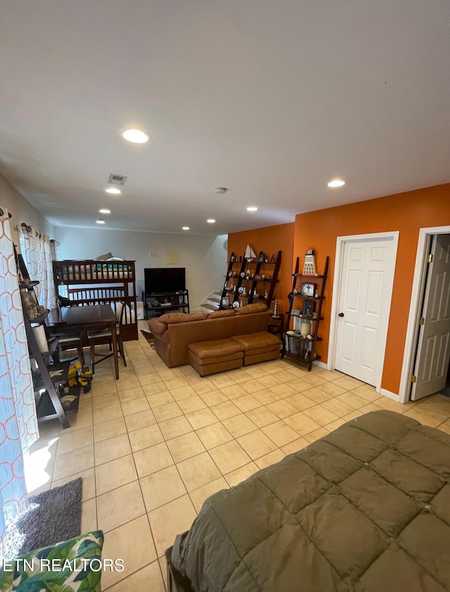 living room with light tile patterned floors