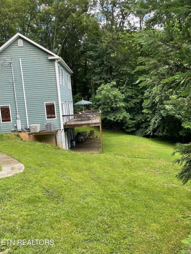 752 Tanglewood Rd, Sharps Chapel, TN 37866 - view of grassy yard with a deck and central air condition unit
