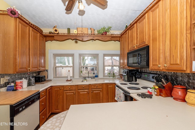 kitchen with decorative backsplash, ceiling fan, white appliances, and sink