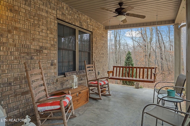 view of patio featuring ceiling fan