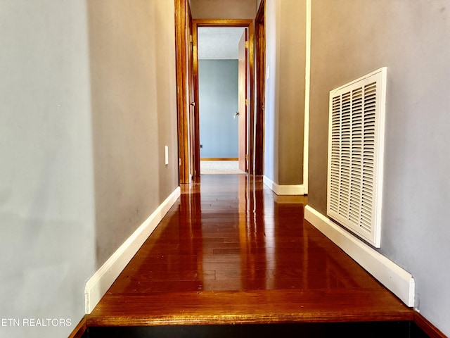 hallway featuring hardwood / wood-style flooring