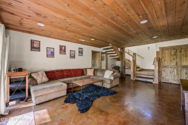 living room with concrete flooring and wooden ceiling