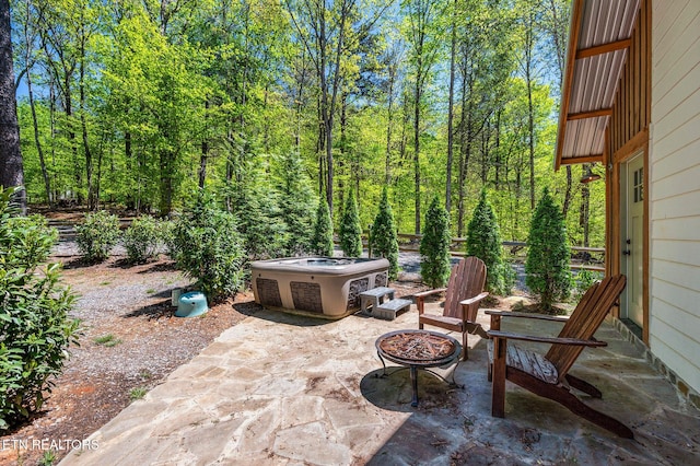 view of patio / terrace featuring a fire pit