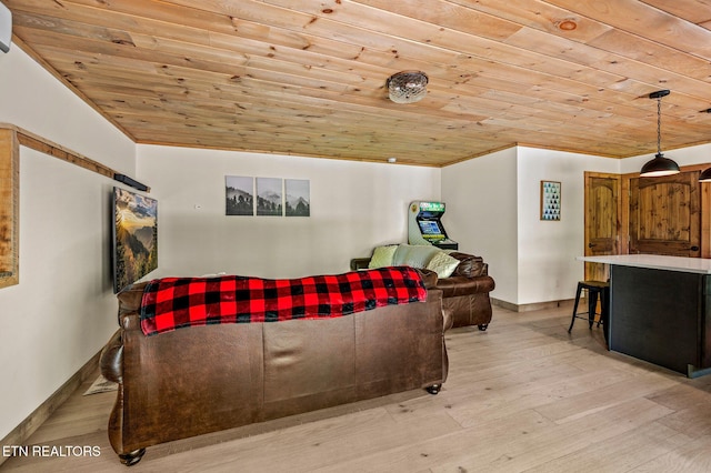 living room with lofted ceiling, light wood-type flooring, wooden ceiling, and crown molding