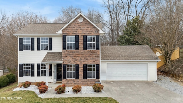 view of front of property featuring a garage