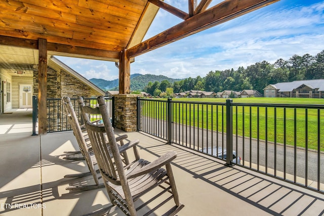 view of patio / terrace with a mountain view