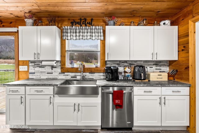 kitchen with wooden ceiling, white cabinets, and stainless steel dishwasher