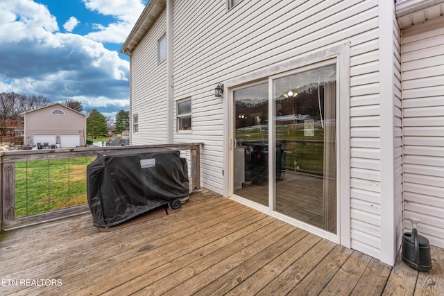 wooden terrace with grilling area