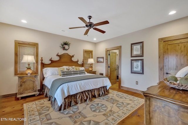 bedroom featuring ceiling fan and light wood-type flooring