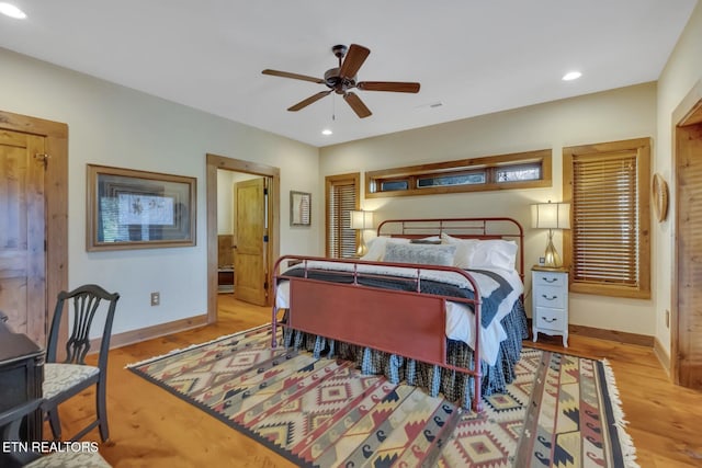 bedroom featuring light wood-type flooring and ceiling fan