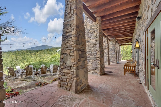 view of patio featuring a mountain view