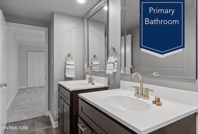 bathroom featuring tile patterned floors and vanity