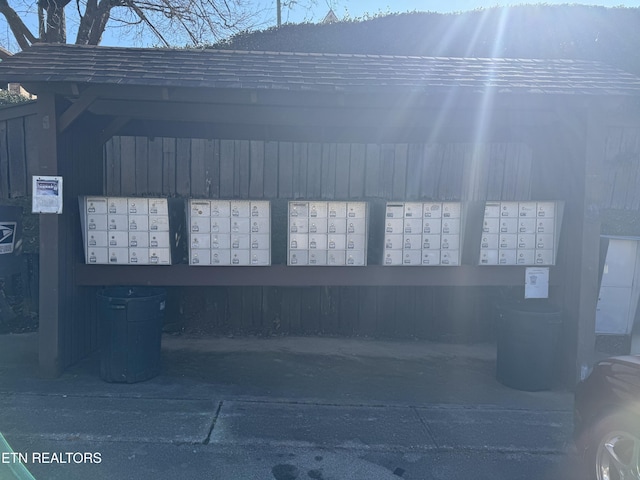 view of home's community with a mail area