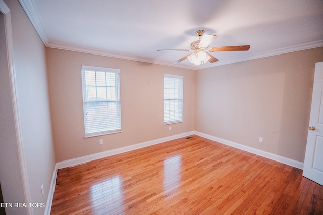 unfurnished room featuring ceiling fan, ornamental molding, and light hardwood / wood-style flooring