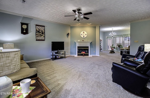 living area featuring a fireplace with flush hearth, ornamental molding, a textured ceiling, and carpet flooring