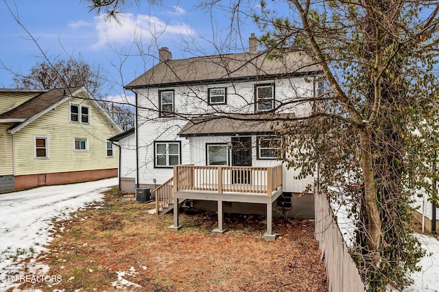 view of front of house with cooling unit and a deck