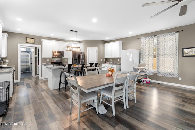 499 Woodland Trl, Sunbright, TN 37872 - dining space featuring dark wood finished floors, a ceiling fan, and recessed lighting