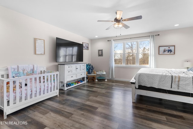 bedroom featuring ceiling fan and dark wood-type flooring