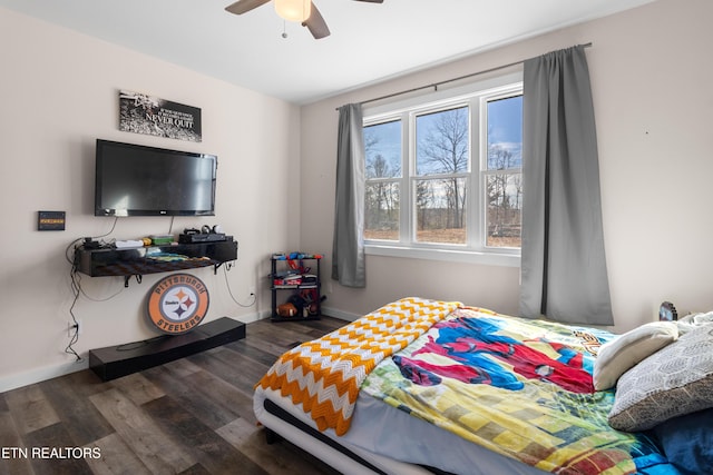 bedroom featuring ceiling fan and dark hardwood / wood-style flooring