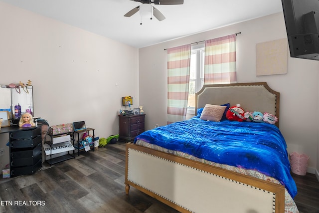 bedroom featuring ceiling fan and dark hardwood / wood-style floors